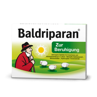 Packung Baldriparan Zur Beruhigung mit Schäfer und Schafen auf grüner Wiese vor Sonne. Pflanzliches Arzneimittel mit Baldrian, Melisse und Hopfen gegen innere Unruhe.