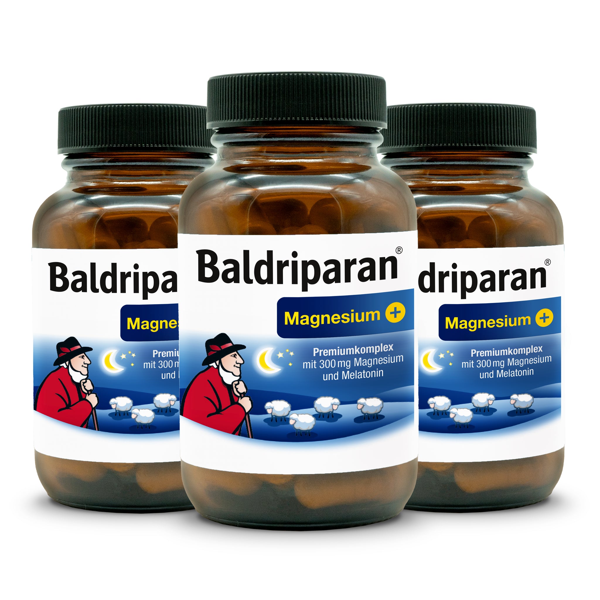 Three brown supplement bottles labeled Baldriparan Magnesium+ with 300 mg magnesium and melatonin, featuring a man in a red coat and white sheep under a crescent moon.